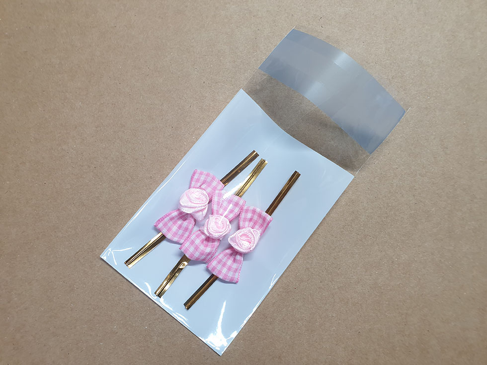 OPP접착 전면투명후면 유백23*30+4(1묶음 1,000장)